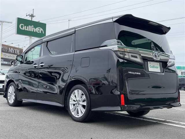 トヨタ ヴェルファイア Z 徳島県 2018(平30)年 5.3万km バーニングブラッククリスタルシャインガラスフレーク 純正メーカーナビ/(AM.FM.CD.DVD.BT.フルセグ)/JBLプレミアムサウンド/純正フリップダウンモニター/プッシュスタート/バックカメラ/ETC/フルセグTV/両側パワースライドドア/ドライブレコーダー/オットマン/横滑り防止装置/コーナーセンサー/レーンキープアシスト/オートライト/オートハイビーム/LEDヘッドライト