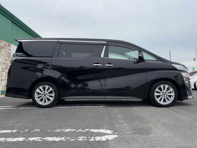 トヨタ ヴェルファイア Z 徳島県 2018(平30)年 5.3万km バーニングブラッククリスタルシャインガラスフレーク 純正メーカーナビ/(AM.FM.CD.DVD.BT.フルセグ)/JBLプレミアムサウンド/純正フリップダウンモニター/プッシュスタート/バックカメラ/ETC/フルセグTV/両側パワースライドドア/ドライブレコーダー/オットマン/横滑り防止装置/コーナーセンサー/レーンキープアシスト/オートライト/オートハイビーム/LEDヘッドライト