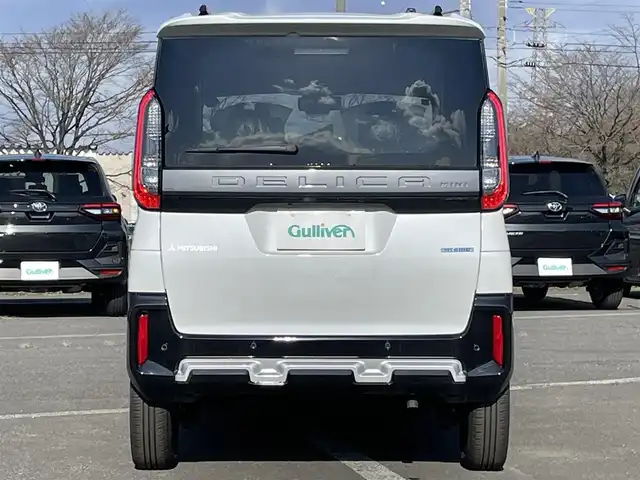 三菱 デリカミニ T プレミアム 道央・札幌 2025(令7)年 0.1千km アメジストブラック/シルキーホワイト ４WD/純正ディスプレイオーディオ/AM/FM/BT/MI-PILOT/衝突被害軽減ブレーキ/横滑り防止装置/レーダークルーズコントロール/ヒルディセントコントロール/レーンキープアシスト/クリアランスソナー/全方位カメラ/アイドリングストップ/デジタルインナーミラー/両側パワースライドドア/前席シートヒーター/ハーフレザーシート/革巻きステアリング/ステアリングリモコン/パドルシフト/ハンドルヒーター/電動パーキング/オートブレーキホールド/プッシュスタート/スマートキー/LEDヘッドライト/オートライト/オートハイビーム/フォグランプ/ヘッドライトレベライザー/電動格納ミラー/ウィンカーミラー/スペアキー