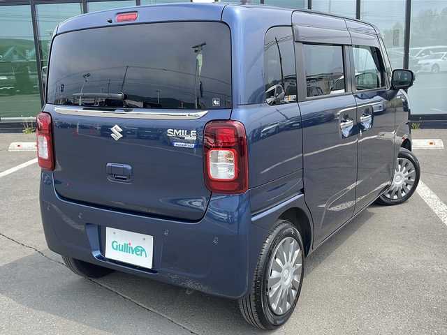 スズキ ワゴンＲ スマイル HYBRID X 道東・釧路十勝 2024(令6)年 1.1万km インディゴブルーメタリック ・メーカーナビ/　（AM　FM　CD　DVD　TV　BT　Applecarplay　Androidauto）/・アラウンドビューモニター/・両側パワースライドドア/・衝突軽減システム/・横滑り防止装置/・レーンキープアシスト/・アイドリングストップ/・スマートキー2本/・プッシュスタート/・LEDライト/・フロントフォグ/・USB充電ポート/・ドアバイザー/・電格ミラー/・コーナーセンサー前後