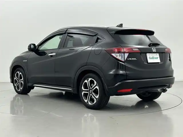 ホンダ ヴェゼル ハイブリッド Z ホンダセンシング 熊本県 2017(平29)年 4.5万km クリスタルブラックパール 純正Gathersナビ（VXM-175VFi）FM・AM・DVD・CD・フルセグTV/ホンダセンシング/・衝突軽減ブレーキ/・アダブティブクルーズコントロール/・先行車発進お知らせ機能/・路外逸脱制御機能/・レーンキープアシスト/・標識認識機能/・オートハイビーム/バックカメラ/社外前後ドライブレコーダー/ビルトインETC/ジャズブラウン内装/純正フロアマット/純正17インチAW/電動パーキング/ブレーキホールド/ハーフレザーシート/前席シートヒーター/オートライト/LEDヘッドライト/フォグランプ/スマートキー/プッシュスタート/スペアキー1本/保証書