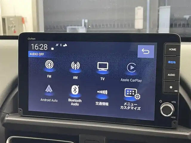 ホンダ フリード ハイブリット e:HEV クロスター 滋賀県 2025(令7)年 0.1千km メテオロイドグレーメタリック 登録済未使用車/純正9インチナビ/【Bluetooth/USB/フルセグTV/Apple CarPlay/Android Auto】/ハーフレザーシート/両側パワースライドドア/バックカメラ/ホンダセンシング/・衝突軽減ブレーキ/・先行車発進お知らせ機能/・歩行者事故低減ステアリング/・路外逸脱抑制機能/・標識認識機能/・渋滞追従機能付アダプティブクルーズコントロール/・車線維持支援システム（LKAS）/・トラフィックジャムアシスト（渋滞運転支援機能）/・ブラインドスポットインフォメーション/・誤発進抑制機能/・後方誤発進抑制機能/・近距離衝突軽減ブレーキ/・急アクセル抑制機能/・パーキングセンサーシステム/・オートハイビーム/・アダプティブドライビングビーム/LEDヘッドライト/D/Nシートヒーター/電動パーキングブレーキ/オートブレーキホールド/プッシュスタート/スマートキー/ステアリングリモコン