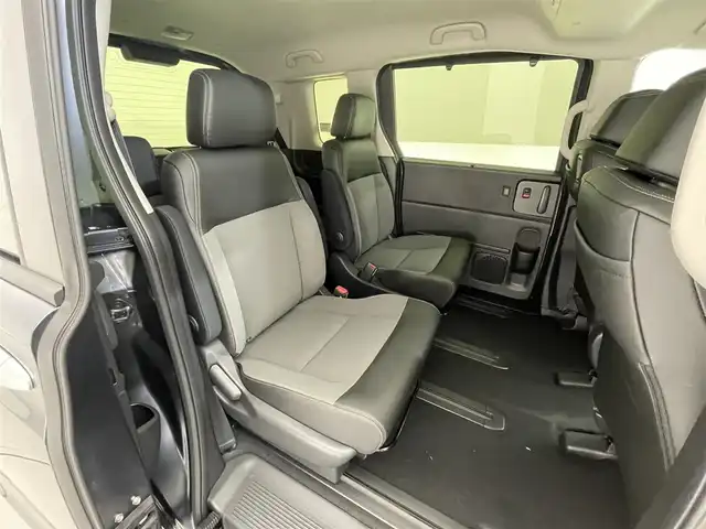 ホンダ フリード ハイブリット e:HEV クロスター 滋賀県 2025(令7)年 0.1千km メテオロイドグレーメタリック 登録済未使用車/純正9インチナビ/【Bluetooth/USB/フルセグTV/Apple CarPlay/Android Auto】/ハーフレザーシート/両側パワースライドドア/バックカメラ/ホンダセンシング/・衝突軽減ブレーキ/・先行車発進お知らせ機能/・歩行者事故低減ステアリング/・路外逸脱抑制機能/・標識認識機能/・渋滞追従機能付アダプティブクルーズコントロール/・車線維持支援システム（LKAS）/・トラフィックジャムアシスト（渋滞運転支援機能）/・ブラインドスポットインフォメーション/・誤発進抑制機能/・後方誤発進抑制機能/・近距離衝突軽減ブレーキ/・急アクセル抑制機能/・パーキングセンサーシステム/・オートハイビーム/・アダプティブドライビングビーム/LEDヘッドライト/D/Nシートヒーター/電動パーキングブレーキ/オートブレーキホールド/プッシュスタート/スマートキー/ステアリングリモコン