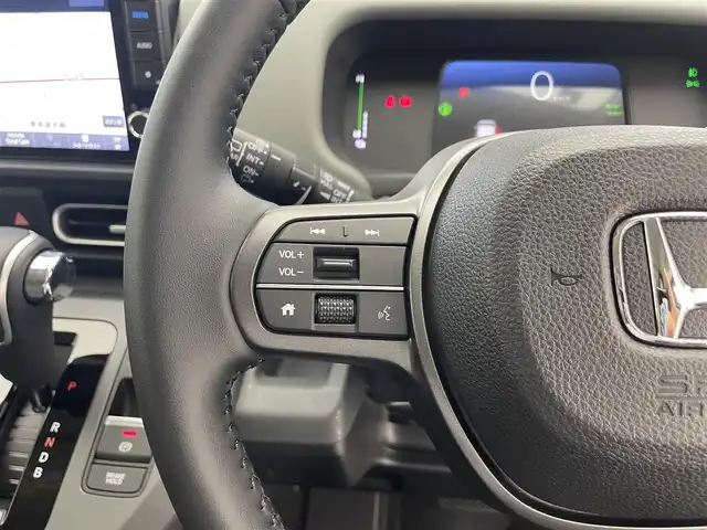 ホンダ フリード ハイブリット e:HEV クロスター 滋賀県 2025(令7)年 0.1千km メテオロイドグレーメタリック 登録済未使用車/純正9インチナビ/【Bluetooth/USB/フルセグTV/Apple CarPlay/Android Auto】/ハーフレザーシート/両側パワースライドドア/バックカメラ/ホンダセンシング/・衝突軽減ブレーキ/・先行車発進お知らせ機能/・歩行者事故低減ステアリング/・路外逸脱抑制機能/・標識認識機能/・渋滞追従機能付アダプティブクルーズコントロール/・車線維持支援システム（LKAS）/・トラフィックジャムアシスト（渋滞運転支援機能）/・ブラインドスポットインフォメーション/・誤発進抑制機能/・後方誤発進抑制機能/・近距離衝突軽減ブレーキ/・急アクセル抑制機能/・パーキングセンサーシステム/・オートハイビーム/・アダプティブドライビングビーム/LEDヘッドライト/D/Nシートヒーター/電動パーキングブレーキ/オートブレーキホールド/プッシュスタート/スマートキー/ステアリングリモコン