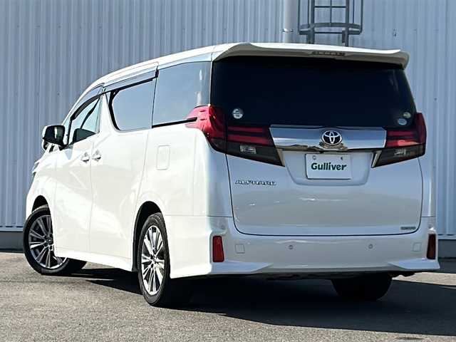 トヨタ アルファード S Aパッケージ タイプブラック 愛媛県 2017(平29)年 10.2万km ホワイトパールクリスタルシャイン フリップダウンモニター/両側パワースライドドア/ビルトインETC/電動リアゲート/社外ナビ（ALPINE）/衝突軽減システム/オートLED/クルーズコントロール追従あり/ドライブレコーダー前/オットマン/バックカメラ/アイドリングストップ/ハーフレザー/HDMI/純正フロアマット/純正18AW/スペアキー