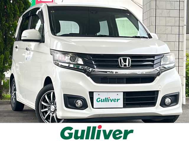 ホンダ Ｎ ＷＧＮ カスタム G ターボパッケージ 東京都 2014(平26)年 9.3万km プレミアムホワイト ワンオーナー/純正ナビ（Bluetooth機能、ラジオ、CD再生）/バックカメラ付き/ETC/MTモード付きAT/パドルシフト/ABS/衝突軽減機能/横滑り防止機能/純正フロアマット/オートエアコン/ハーフレザーシート/ベンチシート/プッシュスタートボタン/電動格納ミラー/純正アルミホイール（14インチ）/オートライト/LEDヘッドライト/保証書/取扱説明書