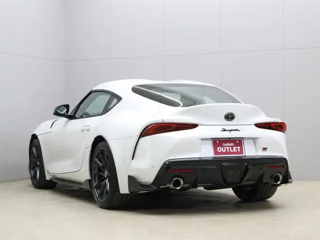 トヨタ スープラ RZ 三重県 2023(令5)年 0.3万km ホワイトメタリック ワンオーナー/OPタン革シート/OPブラック/タンツートン革巻きステアリングホイール/プリクラッシュセーフティ/レーンディパーチャーアラート/ブラインドスポットモニター/アダプティブハイビーム/クルーズコントロール/クリアランスソナー/HDDナビゲーションシステム/・HDDナビ/・地デジTV/・HDDオーディオ/・8.8インチタッチディスプレイ/・Toyota Supra Connect/・Bluetooth/・USB入力端子/・カラーバックガイドモニター/JBLプレミアムサウンドシステム(12スピーカー)/バックカメラ/8.8インチTFTカラー液晶メーター/カラーヘッドアップディスプレイ/純正ドライブレコーダ/純正19インチ10本スポークツヤ消ダークメタリック塗装鍛造アルミホイール/「Supra」ロゴ入brembo製レッドブレーキキャリパー/6灯式LEDヘッドランプ/・オートライト/アダプティブハイビーム/プッシュエンジンスタート/スマートキー×2/新車時保証書/取扱説明書