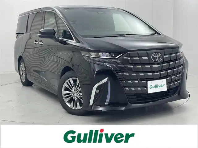 トヨタ アルファード Z 茨城県 2024(令6)年 1.2万km ブラック 純正14型DA/フルセグ/アドバンストパーク/全方位カメラ/左右独立ムーンルーフ/衝突被害軽減ブレーキ/車線逸脱抑制装置/レーダークルーズコントロール/オートマチックハイビーム/クリアランスソナー/BSM/両側電動スライドドア/デジタルインナーミラー/置くだけ充電/ETC2.0/シートヒーター/ベンチレーション/ステアリングヒーター/純正18インチAW/3眼LEDヘッドライト/スマートキー