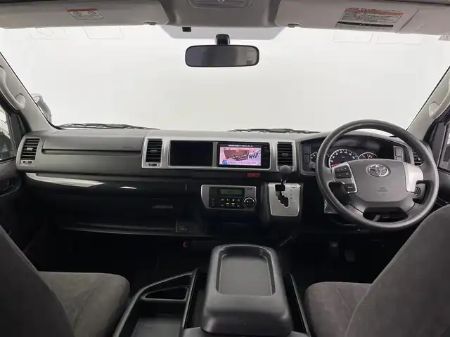 トヨタ ハイエース GL ロング 大分県 2015(平27)年 10万km シルバーマイカM 純正７型ナビ/(CD/DVD/SD/BT/フルセグ）/バックカメラ/純正１１型フリップダウンモニター/モデリスタエアロ/プッシュスタート/コーナーセンサー/片側パワースライド/ＥＴＣ/ステアリングリモコン/フォグランプ