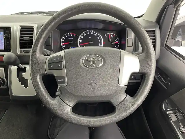 トヨタ ハイエース GL ロング 大分県 2015(平27)年 10万km シルバーマイカM 純正７型ナビ/(CD/DVD/SD/BT/フルセグ）/バックカメラ/純正１１型フリップダウンモニター/モデリスタエアロ/プッシュスタート/コーナーセンサー/片側パワースライド/ＥＴＣ/ステアリングリモコン/フォグランプ