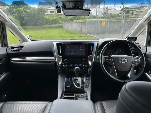 トヨタ アルファード S Cパッケージ 長崎県 2021(令3)年 6.7万km ホワイトパールクリスタルシャイン ワンオーナー/サンルーフ/純正ナビ/（CD/DVD/BT/フルセグ）/バックカメラ/フリップダウンモニター/衝突軽減システム/レーンアシスト/ブラインドスポットモニター/デジタルインナーミラー/パワーシート/シートヒーター/エアシート/ハンドルヒーター/両側パワースライドドア/パワーバックドア/ドライブレコーダー/社外レーダー（AR-G5A）/純正18インチAW