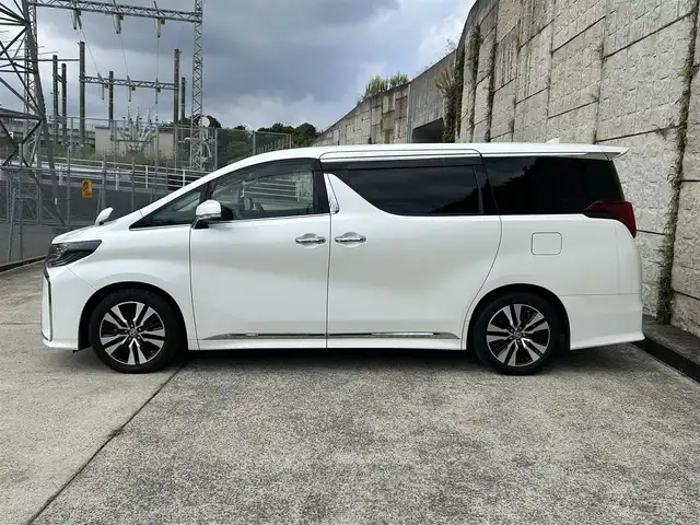 トヨタ アルファード S Cパッケージ 長崎県 2021(令3)年 6.7万km ホワイトパールクリスタルシャイン ワンオーナー/サンルーフ/純正ナビ/（CD/DVD/BT/フルセグ）/バックカメラ/フリップダウンモニター/衝突軽減システム/レーンアシスト/ブラインドスポットモニター/デジタルインナーミラー/パワーシート/シートヒーター/エアシート/ハンドルヒーター/両側パワースライドドア/パワーバックドア/ドライブレコーダー/社外レーダー（AR-G5A）/純正18インチAW