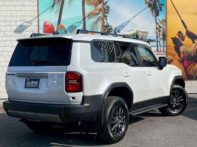 トヨタ ランドクルーザー ２５０ VX 宮崎県 2024(令6)年 0.1万km パール JBLサウンド/シートヒーター/シートエアコン/ドラレコ/純正ナビ/Bluetooth/フルセグ/HDMI/置くだけ充電/全方位カメラ/サンルーフ/デジタルインナーミラー/ETC2.0/パワーバックドア/ドアバイザー/純正フロアマット/ステアリングヒーター
