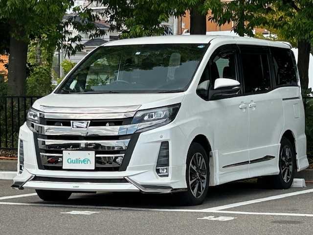 トヨタ ノア Si 宮城県 2017(平29)年 7.6万km ホワイトパールクリスタルシャイン フリップダウンモニター（アルパイン）/社外フルエアロ（モデリスタ）/社外SDナビ/フルセグTV/Bluetooth接続/CD/DVD/トヨタボイスコーナー/トヨタセーフティーセンス/・レーダークルーズコントロール/・レーンキープアシスト/・レーントレーシングアシスト/・プリクラッシュセーフティ/・ロードサインアシスト/・ドライバー異常時対対応システム/オートマチックハイビーム/オートライト/社外ビルドインETC/USB入力端子/純正16インチアルミホイール/社外フロアマット/LEDヘッドライト/3列シート/ウォークスルー/横滑り防止装置/盗難防止装置