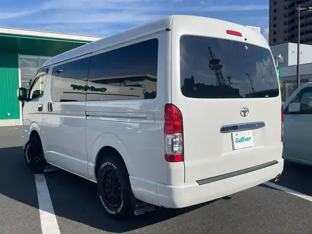 トヨタ ハイエース GL ロング 島根県 2021(令3)年 7.1万km ホワイトパールクリスタルシャイン 社外１０インチフローティングナビ/フルセグＴＶ/ＤＶＤ再生/Bluetooth接続/フリップダウンモニター/全周囲カメラ/パイオニア製ルーフスピーカー/ＥＴＣ２．０/前後ドライブレコーダー/衝突軽減ブレーキ/レーンキープアシスト/前後コーナーセンサー/パワースライドドア/リアゲートイージークローザー/レザー調シートカバー/essex製アルミホイール/LEDヘッドライト/切替式フォグランプ（白/黄）/スペアキー1本