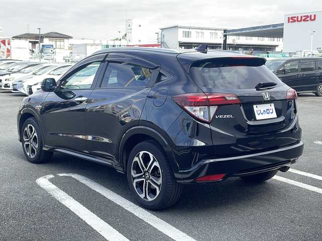 ホンダ ヴェゼル ハイブリッド Z 熊本県 2015(平27)年 10.3万km クリスタルブラックパール (株)IDOMが運営する【じしゃロン熊本店】の自社ローン対象車両になります。こちらは現金ご利用時の価格です。自社ローンご希望の方は別途その旨お申付け下さい。　/純正ナビ（VXM-152VFi）/バックカメラ/フルセグテレビ/DVD/CD/Bluetooth接続/ETC/ハーフレザーシート/シートヒーター/クルーズコントロール/LEDヘッドライト/オートライト/スマートキー/純正17インチアルミホイール