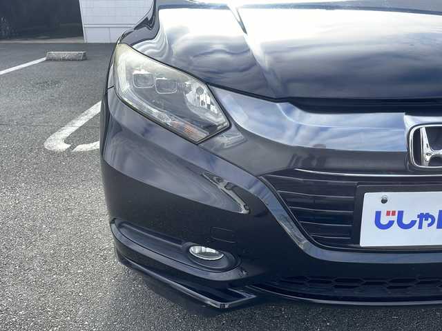 ホンダ ヴェゼル ハイブリッド Z 熊本県 2015(平27)年 10.3万km クリスタルブラックパール (株)IDOMが運営する【じしゃロン熊本店】の自社ローン対象車両になります。こちらは現金ご利用時の価格です。自社ローンご希望の方は別途その旨お申付け下さい。　/純正ナビ（VXM-152VFi）/バックカメラ/フルセグテレビ/DVD/CD/Bluetooth接続/ETC/ハーフレザーシート/シートヒーター/クルーズコントロール/LEDヘッドライト/オートライト/スマートキー/純正17インチアルミホイール