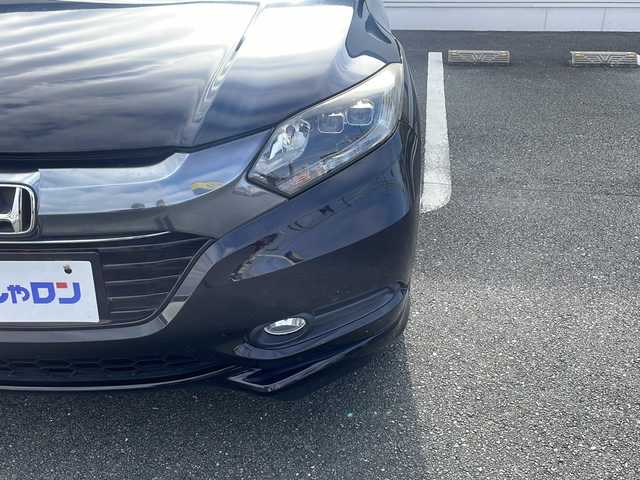 ホンダ ヴェゼル ハイブリッド Z 熊本県 2015(平27)年 10.3万km クリスタルブラックパール (株)IDOMが運営する【じしゃロン熊本店】の自社ローン対象車両になります。こちらは現金ご利用時の価格です。自社ローンご希望の方は別途その旨お申付け下さい。　/純正ナビ（VXM-152VFi）/バックカメラ/フルセグテレビ/DVD/CD/Bluetooth接続/ETC/ハーフレザーシート/シートヒーター/クルーズコントロール/LEDヘッドライト/オートライト/スマートキー/純正17インチアルミホイール