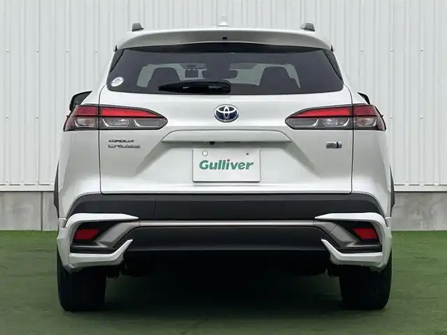 トヨタ カローラ クロス ハイブリッド Z 香川県 2022(令4)年 1.3万km プラチナホワイトパールマイカ 登録時走行距離：12752km/メーカー純正ナビ/　BT接続/全方位カメラ/プリクラッシュセーフティシステム/レーンキープアシスト/レーダークルーズコントロール/クリアランスソナー/ブラインドスポットモニター/オートハイビーム/LEDヘッドライト/オートライト/フォグランプ/レベライザヘッドライト/パワーバックドア/ビルトインETC2.0/前後ドライブレコーダー/ハーフレザーシート/シートヒーター/パワーシート/革巻きステアリング/ステアリングスイッチ/オートホールド機能付き電子パーキングブレーキ/プッシュスタート/スマートキー