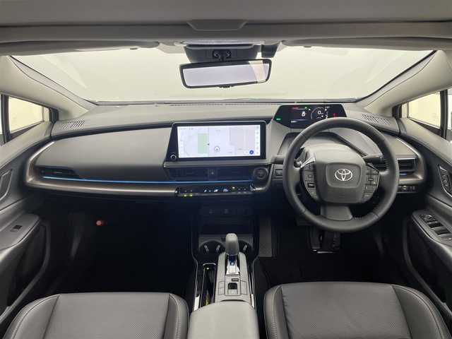 トヨタ プリウス Z 岡山県 2024(令6)年 0.4万km プラチナホワイトパールマイカ パノラマガラスルーフ/モデリスタエアロ（前・横・後下）	/純正１２．３インチディスプレイオーディオ	/【ナビ/フルセグ/Bluetooth/Carplay】	/パノラミックビューモニター	/追従型クルーズコントロール	/オートハイビーム	/LEDヘッドライト（AUTO機能付き）	/ビルトインETC２．０/デジタルインナーミラー/前席シートヒーター	/ステアリングヒーター/前席エアシート/運転席パワーシート	/衝突軽減ブレーキシステム	/車線逸脱防止システム	/横滑り防止装置/踏み間違い防止装置	/ブラインドスポットモニター/オートブレーキホールド/純正ドライブレコーダー（前後）	/純正19インチアルミ	/コーナーセンサー（前後）	/純正フロアマット	/ステアリングスイッチ	/ISOFIX/チルトステアリング/シートリフター/ウィンカーミラー/ドアバイザー/プッシュスタート	/新車保証書/スペアキー×1