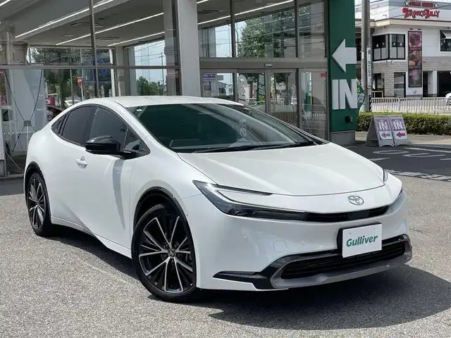 トヨタ プリウス Z 愛知県 2024(令6)年 0.5万km プラチナホワイトパールマイカ /禁煙車//純正メモリナビ//12.3インチディスプレイ・フルセグTV・Bluetooth・AM・FM・USB・Apple CarPlay・Android Auto//パノラミックビューモニター//ETC2.0//前後ドライブレコーダー//パワーバックドア//スペアタイヤ//純正19インチアルミホイール//LEDオートライト//オートマチックハイビーム//Toyota Safety System//プリクラッシュセーフティ//緊急時操舵支援//フロントクロストラフィックアラート//レーンチェンジアシスト//レーントレーシングアシスト//レーンディパーチャーアラート//レーダークルーズコントロール//ロードサインアシスト//ドライバー異常時対応システム//プロアクティブドライビングシスト//発進遅れ告知//ブラインドスポットモニター//安心降車アシスト//車両接近告知//トヨタチームメイト(アドバンストパーク)//パーキングサポートブレーキ//横滑り防止//トラクションコントロール//ヒルスタートアシスト//合皮シート//運転席パワーシート