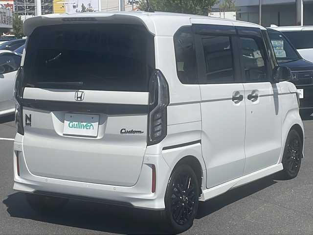 ホンダ Ｎ ＢＯＸ カスタム L ターボ スタイル+ブラック 長野県 2022(令4)年 2.8万km プラチナホワイトパール 純正SDナビ(VXM-225Ci)/　・FM/AM/Bluetooth/CD/バックカメラ/クルーズコントロール/前後ドライブレコーダー(SN-TW84)/両側電動スライドドア/衝突被害軽減ブレーキ/クリアランスソナー/レーンキープアシスト/コーナーセンサー/前席シートヒーター/ステアリングスイッチ/純正フロアマット/カーテンエアバッグ/オートエアコン/オートライト/オートハイビーム/横滑り防止機能/ABS/パワーステアリング/パワーウインドウ