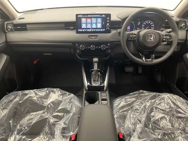 ホンダ ヴェゼル ハイブリッド e:HEV Z 愛媛県 2025(令7)年 0.1千km クリスタルブラックパール e:HEV Z　4VC4AZ　Honda CONNECTディスプレー+ETC2.0車載器+ワイヤレス充電器(231/000)/登録済未使用車　純正９型ナビ　バックカメラ　衝突被害軽減ブレーキ　ホンダセンシング　フルセグ　Ｂｌｕｅｔｏｏｔｈ　電動リアゲート　レーンアシスト　アダプティブクルーズコントロール　ＥＴＣ２．０　禁煙車