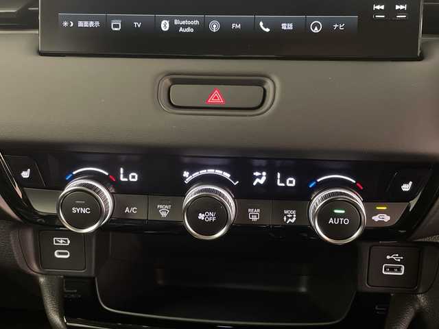 ホンダ ヴェゼル ハイブリッド e:HEV Z 愛媛県 2025(令7)年 0.1千km クリスタルブラックパール e:HEV Z　4VC4AZ　Honda CONNECTディスプレー+ETC2.0車載器+ワイヤレス充電器(231/000)/登録済未使用車　純正９型ナビ　バックカメラ　衝突被害軽減ブレーキ　ホンダセンシング　フルセグ　Ｂｌｕｅｔｏｏｔｈ　電動リアゲート　レーンアシスト　アダプティブクルーズコントロール　ＥＴＣ２．０　禁煙車