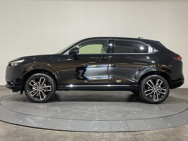 ホンダ ヴェゼル ハイブリッド e:HEV Z 愛媛県 2025(令7)年 0.1千km クリスタルブラックパール e:HEV Z　4VC4AZ　Honda CONNECTディスプレー+ETC2.0車載器+ワイヤレス充電器(231/000)/登録済未使用車　純正９型ナビ　バックカメラ　衝突被害軽減ブレーキ　ホンダセンシング　フルセグ　Ｂｌｕｅｔｏｏｔｈ　電動リアゲート　レーンアシスト　アダプティブクルーズコントロール　ＥＴＣ２．０　禁煙車