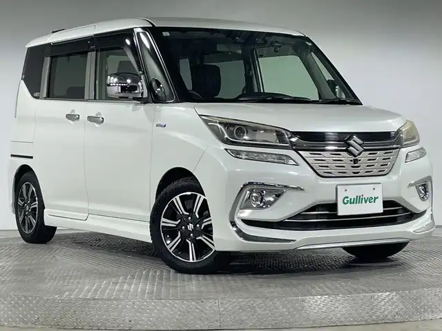 スズキ ソリオ バンディット HV MV 神奈川県 2019(平31)年 3.3万km ピュアホワイトP 純正8型DOナビ【CN-RZ846】/CD DVD Bluetooth フルセグTV USB SD/バックカメラ/両側パワースライドドア/スズキセーフティサポート/・デュアルカメラブレーキサポート/・横滑り防止機能/・アダプティブクルーズコントロール/・誤発進抑制機能/・車線逸脱警報機能/・ふらつき防止機能/・先行車発進お知らせ機能/・ハイビームアシスト/・リヤパーキングセンサー/ビルトインETC/パドルシフト/前方方向ドライブレコーダー/ステアリングリモコン/純正フロアマット/オートライト/純正15インチアルミホイール/スマートキー/純正ドアバイザー