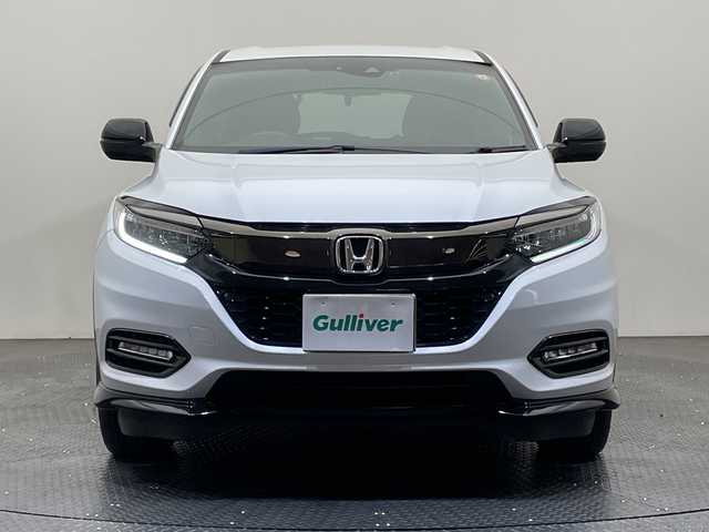 ホンダ ヴェゼル ハイブリッド RS ホンダセンシング 愛媛県 2021(令3)年 3.8万km プラチナホワイトパール 純正8型ナビ（VXM-205VFEi)/DVD　Bluetooth/前後ドライブレコーダー　/シートヒーター　/ビルドインETC/Honda SENSING（衝突軽減ブレーキ〈CMBS〉、誤発進抑制機能、歩行者事故低減ステアリング、/路外逸脱抑制機能、ACC〈アダプティブ・クルーズ・コントロール〉、LKAS〈車線維持支援システム〉、/先行車発進お知らせ機能、標識認識機能）/コンビシート＆専用インテリア【ウルトラスエート】/ボディーロアーガーニッシュ（RS仕様）/（フロントバンパーロアーガーニッシュ、サイドシルガーニッシュ、/リアバンパーロアーガーニッシュ、ホイールアーチプロテクター）