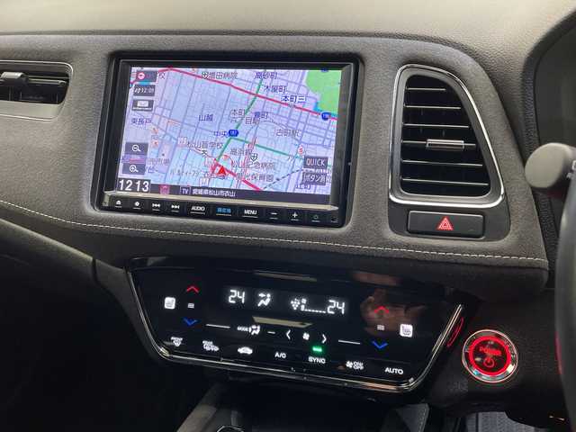 ホンダ ヴェゼル ハイブリッド RS ホンダセンシング 愛媛県 2021(令3)年 3.8万km プラチナホワイトパール 純正8型ナビ（VXM-205VFEi)/DVD　Bluetooth/前後ドライブレコーダー　/シートヒーター　/ビルドインETC/Honda SENSING（衝突軽減ブレーキ〈CMBS〉、誤発進抑制機能、歩行者事故低減ステアリング、/路外逸脱抑制機能、ACC〈アダプティブ・クルーズ・コントロール〉、LKAS〈車線維持支援システム〉、/先行車発進お知らせ機能、標識認識機能）/コンビシート＆専用インテリア【ウルトラスエート】/ボディーロアーガーニッシュ（RS仕様）/（フロントバンパーロアーガーニッシュ、サイドシルガーニッシュ、/リアバンパーロアーガーニッシュ、ホイールアーチプロテクター）