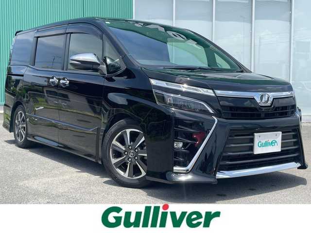 トヨタ ヴォクシー ZS 煌 福岡県 2018(平30)年 9.4万km ブラック 横滑り防止機能/盗難防止/衝突被害軽減ブレーキ/オートマチックハイビーム/ドラレコ/Bカメ/ACC/純正ナビ/Bluetooth/CD/USB/HDMI/SD/フルセグTV/ビルトインETC/純正フロアマット/純正AW/ウォークスルー/3列シート/両側パワースライドドア/WAC/Dualエアコン/ECOmode
