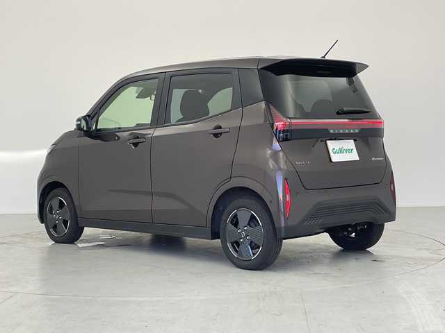 日産 サクラ X 愛知県 2024(令6)年 0.5万km アッシュブラウンM 純正ディスプレイオーディオ/・Bluetooth/・AppleCarPlay/・AndroidAuto/・HDMI/アラウンドビューモニター/プッシュスタート/電動パーキング/オートホールド機能/電動格納ミラー/純正フロアマット/オートライト/LEDヘッドライト/コーナーセンサー/純正14インチアルミホイール/エマージェンシーブレーキ/LDW（車線逸脱警報）