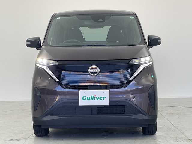 日産 サクラ X 愛知県 2024(令6)年 0.5万km アッシュブラウンM 純正ディスプレイオーディオ/・Bluetooth/・AppleCarPlay/・AndroidAuto/・HDMI/アラウンドビューモニター/プッシュスタート/電動パーキング/オートホールド機能/電動格納ミラー/純正フロアマット/オートライト/LEDヘッドライト/コーナーセンサー/純正14インチアルミホイール/エマージェンシーブレーキ/LDW（車線逸脱警報）