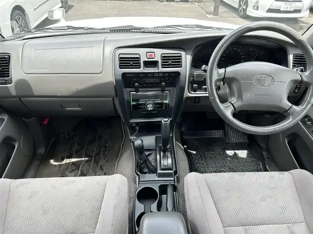 トヨタ ハイラックス サーフ SSR－G ワイド 福島県 2002(平14)年 11.7万km ホワイト/シルバーM ４ＷＤ/Ｃａｒｒｏｚｚｅｒｉａオーディオ/・ＣＤ/・ＡＭ/・ＦＭ/・音楽再生（USB接続）/オートエアコン/バックドアガラス開閉/ＡＣ１００Ｖ/ハロゲンヘッドライト/純正フロアマット/純正ドアバイザー/Ｗエアバック/スペアキー
