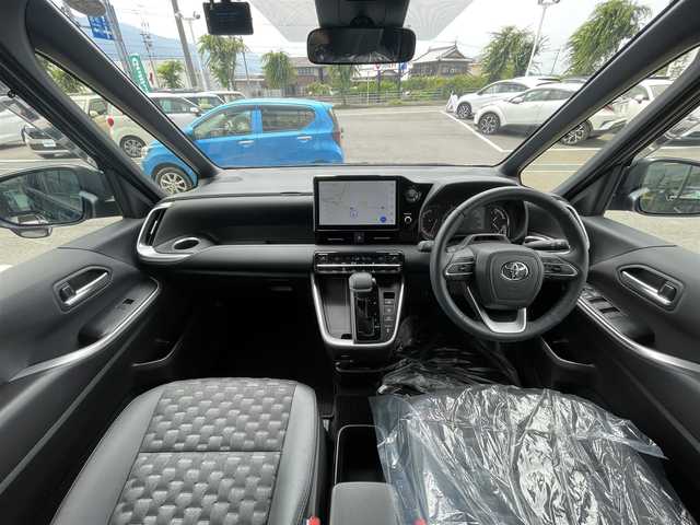トヨタ ヴォクシー S－Z 愛媛県 2023(令5)年 1.3万km アティチュードブラックマイカ トヨタセーフティ/アダプテイブクルーズコントロール/レーンキープアシスト/純正10.5インチディスプレイオーディオ/　CD/DVD/Bluetooth/HDMI/フルセグTV/バックカメラ/ビルトインETC2.0/前後ドライブレコーダー(コムテック製)/両側パワースライドドア/ハーフレザーシート/前席シートヒーター/純正17インチAW/純正フロアマット/オート電動格納ミラー/プッシュスタート/オートライト/LEDヘッドライト