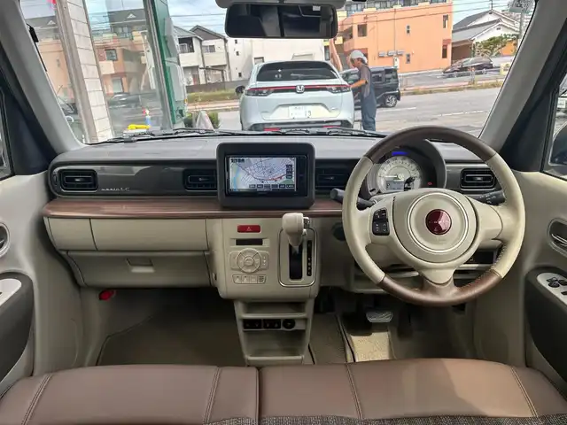 スズキ ラパン ＬＣ X 愛知県 2025(令7)年 0.3万km フォーンベージュメタリック/アーバンブラウン 2トーン SDナビ(ワンセグ/BT/USB/CD/AM/FM)/アラウンドビューモニター/バックカメラ/ETC/シートヒーター/ベンチシート/純正フロアマット/衝突被害軽減システム/ABS/横滑り防止装置/レーンキープアシスト/盗難防止装置/アイドリングストップ/オートライト/オートマチックハイビーム/電動格納式ミラー/コーナーセンサー/スペアキー/スマートキー/保証書/取扱説明書