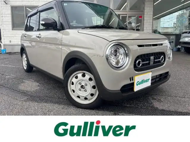 スズキ ラパン ＬＣ X 愛知県 2025(令7)年 0.3万km フォーンベージュメタリック/アーバンブラウン 2トーン SDナビ(ワンセグ/BT/USB/CD/AM/FM)/アラウンドビューモニター/バックカメラ/ETC/シートヒーター/ベンチシート/純正フロアマット/衝突被害軽減システム/ABS/横滑り防止装置/レーンキープアシスト/盗難防止装置/アイドリングストップ/オートライト/オートマチックハイビーム/電動格納式ミラー/コーナーセンサー/スペアキー/スマートキー/保証書/取扱説明書