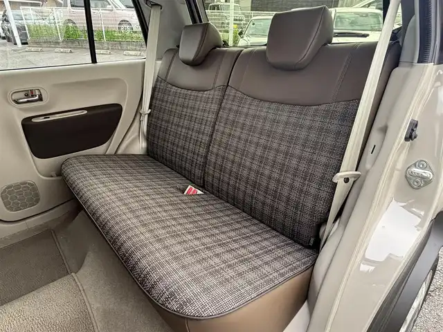 スズキ ラパン ＬＣ X 愛知県 2025(令7)年 0.3万km フォーンベージュメタリック/アーバンブラウン 2トーン SDナビ(ワンセグ/BT/USB/CD/AM/FM)/アラウンドビューモニター/バックカメラ/ETC/シートヒーター/ベンチシート/純正フロアマット/衝突被害軽減システム/ABS/横滑り防止装置/レーンキープアシスト/盗難防止装置/アイドリングストップ/オートライト/オートマチックハイビーム/電動格納式ミラー/コーナーセンサー/スペアキー/スマートキー/保証書/取扱説明書