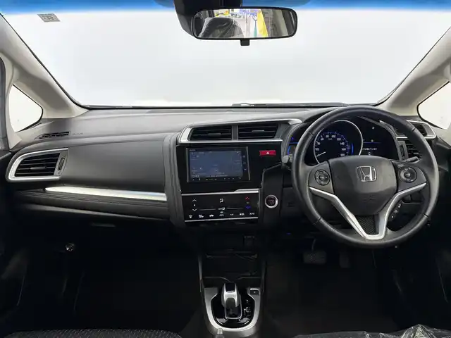 ホンダ フィット ハイブリット Lパッケージ 愛知県 2015(平27)年 2.2万km プレミアムホワイトパールⅡ 純正ナビ/バックカメラ/地デジTV/クルーズコントロール/横滑り防止装置/低速域衝突軽減ブレーキ/誤発進抑制機能/オートライト/LEDヘッドライト/ETC/モデューロ15インチアルミホイール/フロアマット/プッシュスタート/スマートキー/スペアキー