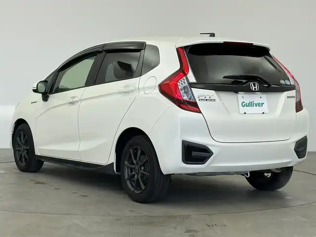 ホンダ フィット ハイブリット Lパッケージ 愛知県 2015(平27)年 2.2万km プレミアムホワイトパールⅡ 純正ナビ/バックカメラ/地デジTV/クルーズコントロール/横滑り防止装置/低速域衝突軽減ブレーキ/誤発進抑制機能/オートライト/LEDヘッドライト/ETC/モデューロ15インチアルミホイール/フロアマット/プッシュスタート/スマートキー/スペアキー