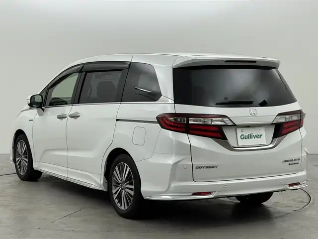 ホンダ オデッセイ ハイブリッド アブソルート・EXホンダセンジング 福岡県 2018(平30)年 4.9万km プラチナホワイトパール 純正ナビ（フルセグTV）/全方位カメラ　/後席モニター　/ビルトインＥＴＣ２．０　/前後ドライブレコーダー　/ホンダセンシング　/アダプティブクルーズコントロール　/コーナーセンサー　/衝突被害軽減ブレーキ　/レーンキープ　/ＢＳＭ　/パーキングアシスト　/先行車発進お知らせ　/標識認識機能　/両側電動スライドドア　/ハーフレザーシート　/シートヒーター