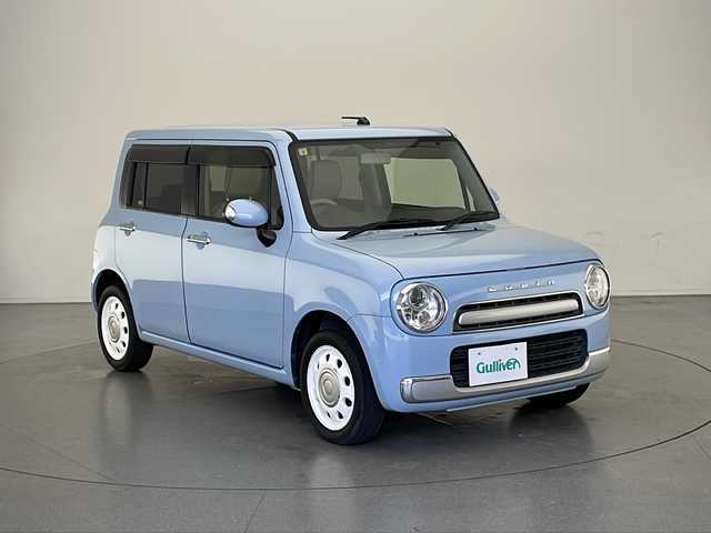スズキ ラパン ショコラ X 長野県 2014(平26)年 6.5万km エアブルーメタリック 社外SDナビ（型番：NR-MZ33)/(ワンセグTV/DVD/CD/BL）/バックカメラ/ETC/合皮シート/純正ホイールキャップ/社外フロアマット/アイドリングストップ/ドアバイザー/ウィンカーランプ/オートライト/オートエアコン/スマートキー/スペアキー1本/保証書/取扱説明書