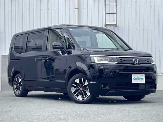 ホンダ ステップワゴン eHEV エアー EX 三重県 2025(令7)年 0.1千km クリスタルブラックパール 登録済未使用車/純正11.4型ナビ /バックカメラ /BSM /両側パワースライドドア/パワーバックドア /前席シートヒーター /USB・タイプC給電/前後コーナーセンサー /レーダークルーズコントロール /レーンキープアシスト/衝突軽減ブレーキ/革巻きステアリング/ステアリングスイッチ/LEDヘッドライト/オートハイビーム/オートライト/オットマン /スペアキー /ウォークスルー/LEDヘッドライト/電動格納ミラー/禁煙車