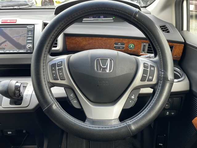 ホンダ フリード ハイブリット ジャストセレクション 山口県 2012(平24)年 9.9万km プレミアムホワイトパール 純正ナビ/DVD/CD/MSV/ワンセグTV/バックカメラ/両側パワースライドドア/純正HIDヘッドライト/純正フォグランプ/オートライト/ハーフレザーシート/革巻きステアリング/ステアリングスイッチ/クルーズコントロール/ウッド調パネル/横滑り防止/スマートキー×２/ビルトインETC/純正フロアマット/純正ドアバイザー/電動格納ウインカードアミラー