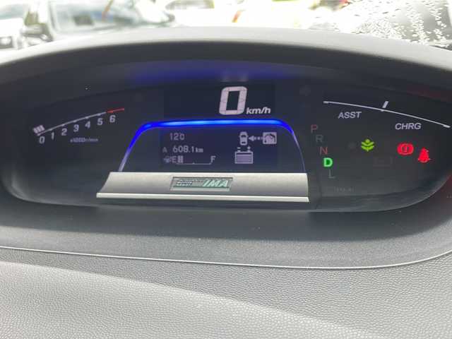 ホンダ フリード ハイブリット ジャストセレクション 山口県 2012(平24)年 9.9万km プレミアムホワイトパール 純正ナビ/DVD/CD/MSV/ワンセグTV/バックカメラ/両側パワースライドドア/純正HIDヘッドライト/純正フォグランプ/オートライト/ハーフレザーシート/革巻きステアリング/ステアリングスイッチ/クルーズコントロール/ウッド調パネル/横滑り防止/スマートキー×２/ビルトインETC/純正フロアマット/純正ドアバイザー/電動格納ウインカードアミラー