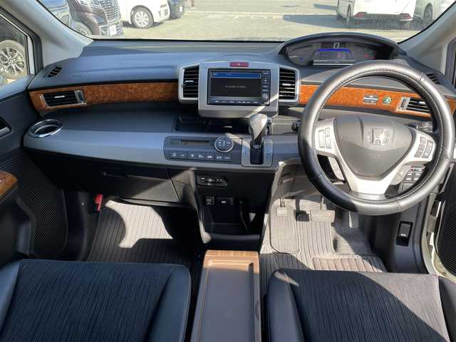 ホンダ フリード ハイブリット ジャストセレクション 兵庫県 2012(平24)年 9.9万km プレミアムホワイトパール 【(株)IDOMが運営する【じしゃロン姫路店】の自社ローン対象車両になります。こちらは現金ご利用時の価格です。自社ローンご希望の方は別途その旨お申付け下さい。】/純正ナビ/DVD/CD/MSV/ワンセグTV/バックカメラ/両側パワースライドドア/純正HIDヘッドライト/純正フォグランプ/オートライト/ハーフレザーシート/革巻きステアリング/ステアリングスイッチ/クルーズコントロール/ウッド調パネル/横滑り防止/スマートキー×２/ビルトインETC/純正フロアマット/純正ドアバイザー/電動格納ウインカードアミラー