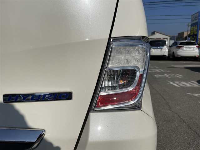 ホンダ フリード ハイブリット ジャストセレクション 兵庫県 2012(平24)年 9.9万km プレミアムホワイトパール 【(株)IDOMが運営する【じしゃロン姫路店】の自社ローン対象車両になります。こちらは現金ご利用時の価格です。自社ローンご希望の方は別途その旨お申付け下さい。】/純正ナビ/DVD/CD/MSV/ワンセグTV/バックカメラ/両側パワースライドドア/純正HIDヘッドライト/純正フォグランプ/オートライト/ハーフレザーシート/革巻きステアリング/ステアリングスイッチ/クルーズコントロール/ウッド調パネル/横滑り防止/スマートキー×２/ビルトインETC/純正フロアマット/純正ドアバイザー/電動格納ウインカードアミラー