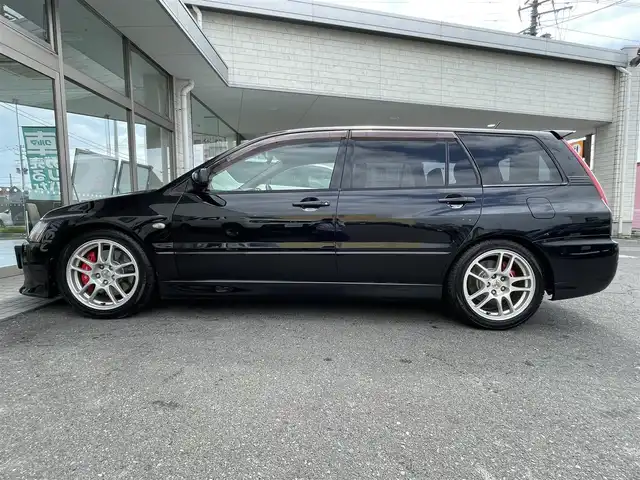 三菱 ランサー ワゴン GT－A エボリューション 青森県 2005(平17)年 13.2万km アメジストブラック 4WD/bremboブレーキキャリパー/MOMOステアリング/TEIN車庫調/Defiメーター/Recaroシート/HKSサイレントハイパワーマフラー/ACD(R6年ユニット交換済み）/17インチ純正アルミホイール/R6年車検時ヘッドライト/ディスクローター交換済み/社外エンジンスターター/社外オーディオ（BlueTooth/CD/ラジオ）/R2年102153キロ時タイミングベルト交換/取扱説明書/保証書